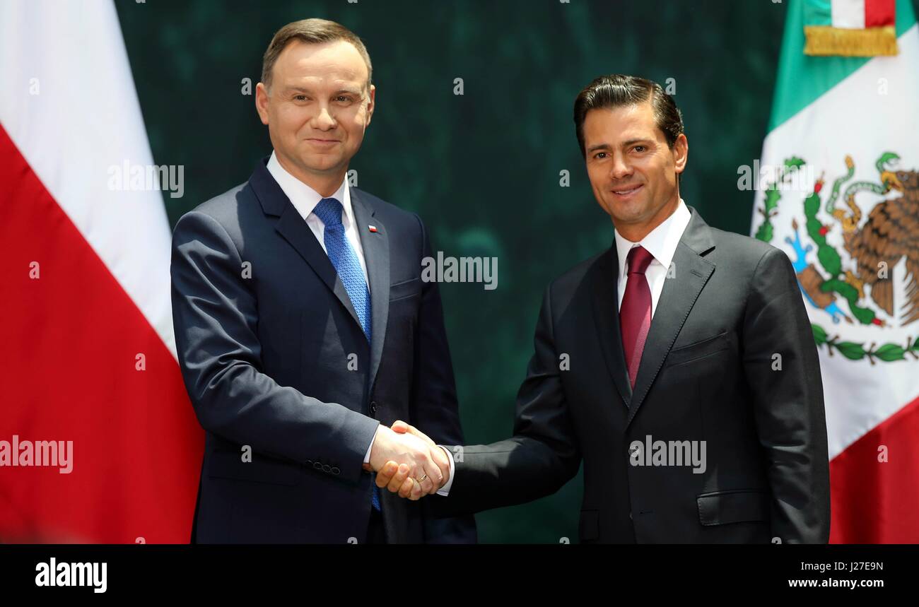Mexican President Enrique Pena Nieto, right, shakes hands with Polish President Andrzej Duda following a joint press conference at the national palace April 24, 2017 in Mexico City, Mexico. Stock Photo
