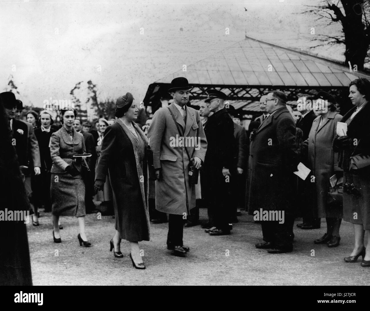 Nov. 11, 1953 - Queen Mother Sees Her Horse Win At Kempton Park Races: The Queen Mother and Princess Margaret were at Kempton Park races this afternoon, to see the Royal chaser M'as-tu-vu run in the Queen Mother's Colours for the first time. The horse, a French-bred seven year old won the Wimbledon Handicap 'Chase. Photo shows The Queen Mother and Princess Margaret leaving the paddock on her way to the Royal enclosure, after inspecting her horse. (Credit Image: © Keystone Press Agency/Keystone USA via ZUMAPRESS.com) Stock Photo