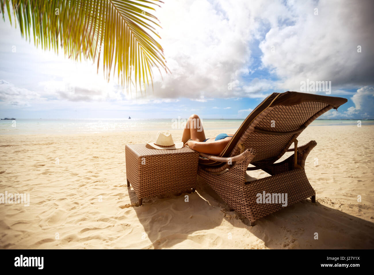 Relax on sunbeds on peaceful beach, holiday and vacation Stock Photo