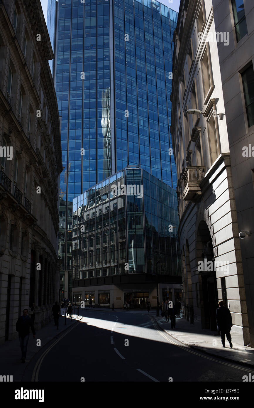 Reflected light with old and new buildings in the City of London ...