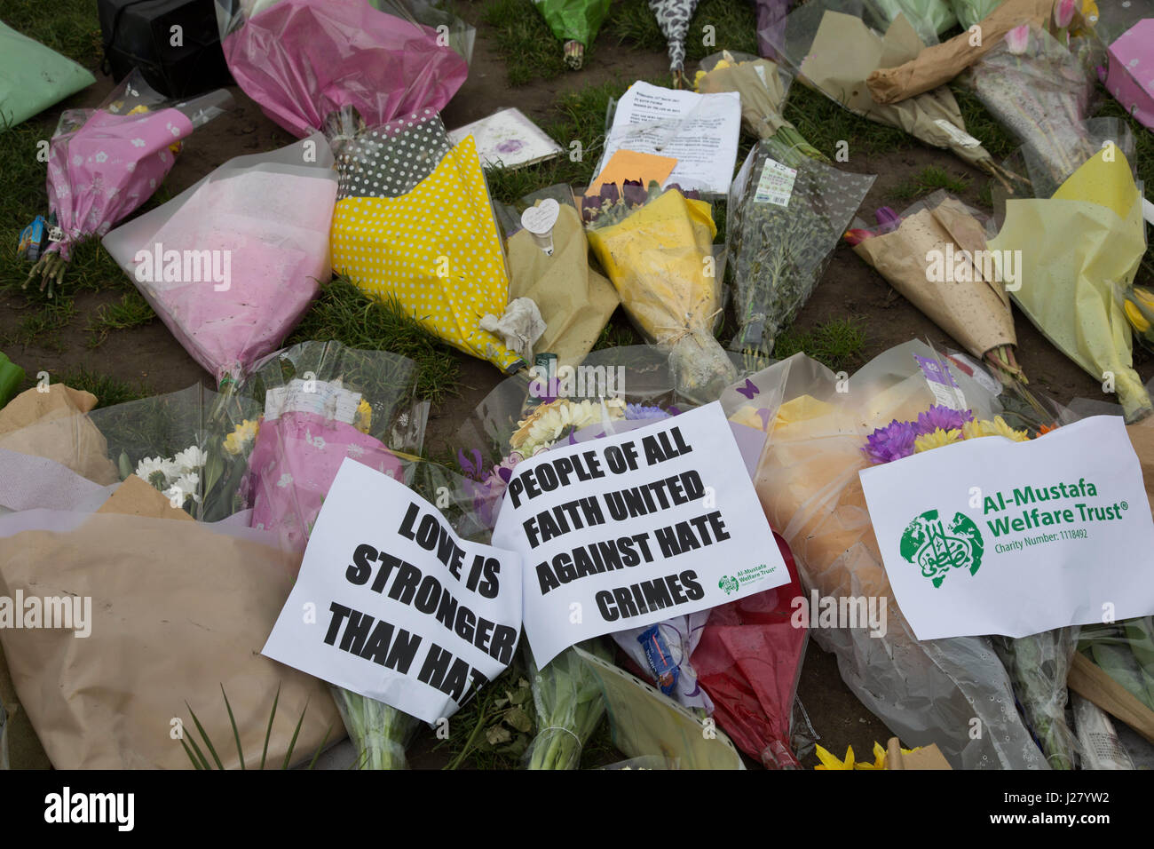 Memorial flowers and notices to PC Keith Palmer who was killed during the Westminster terror attack in London, England, United Kingdom. Stock Photo