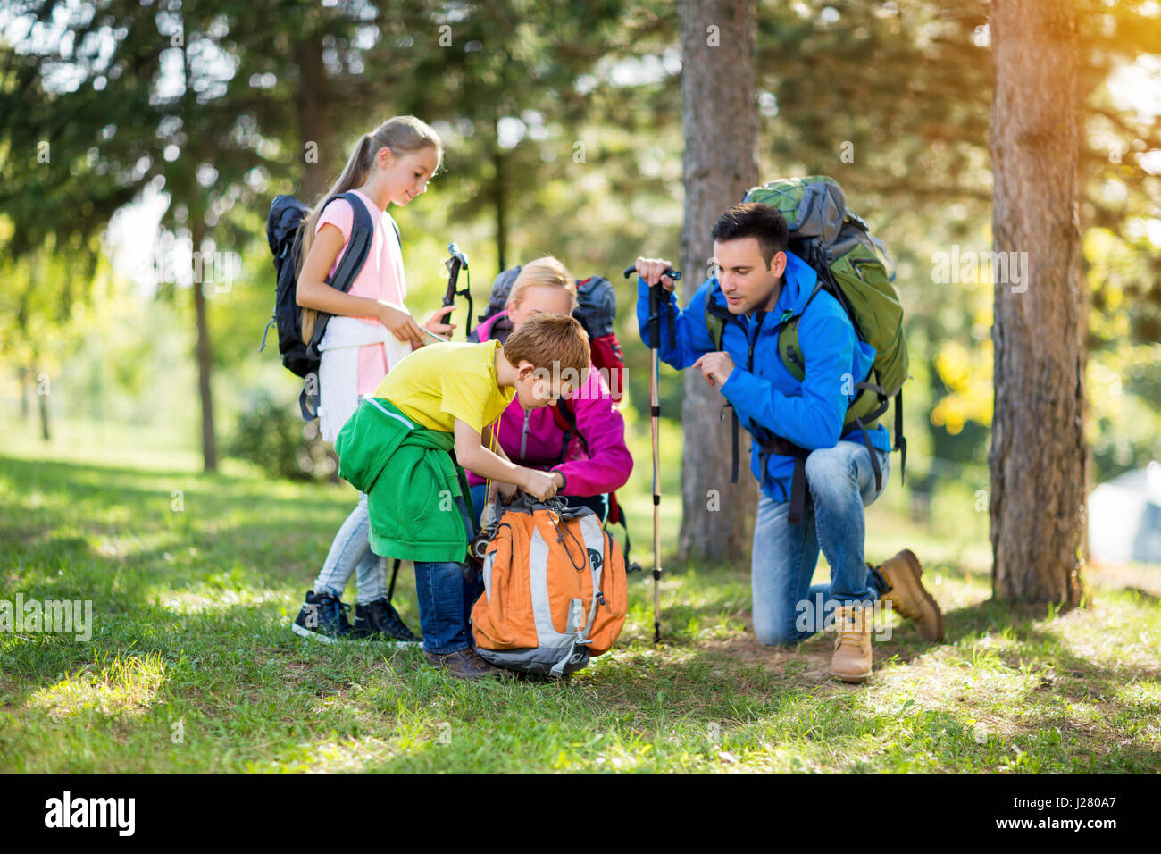 family in the mountains hiking Stock Photo - Alamy