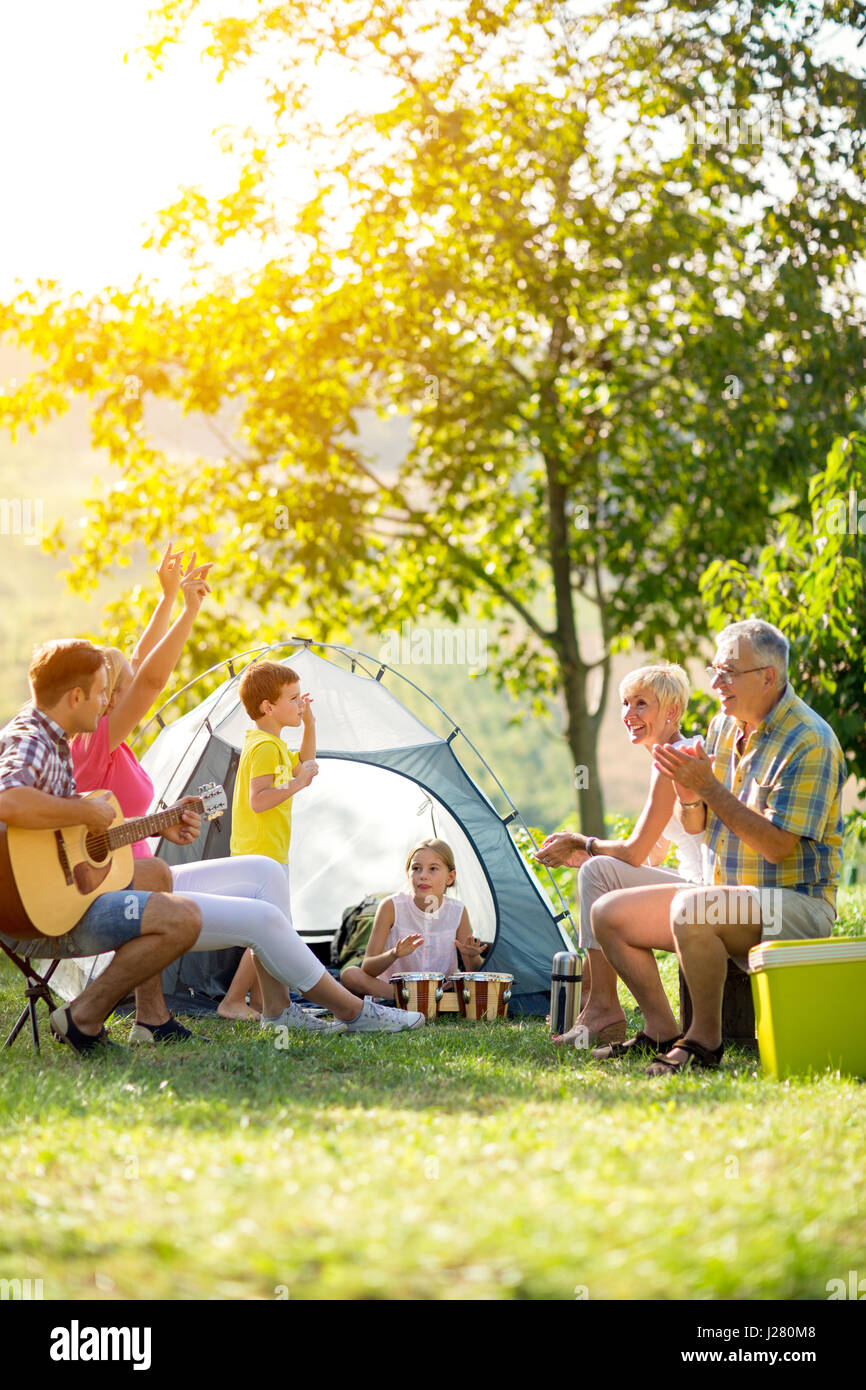 happy family enjoying on summer day on camping Stock Photo