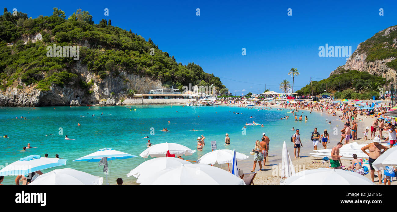 Corfu, Greece -August 17, 2015: Beautiful beach in Paleokastritsa on Corfu, tourists enjoying a nice summer day at the beach. Kerkyra (Corfu), Greece Stock Photo