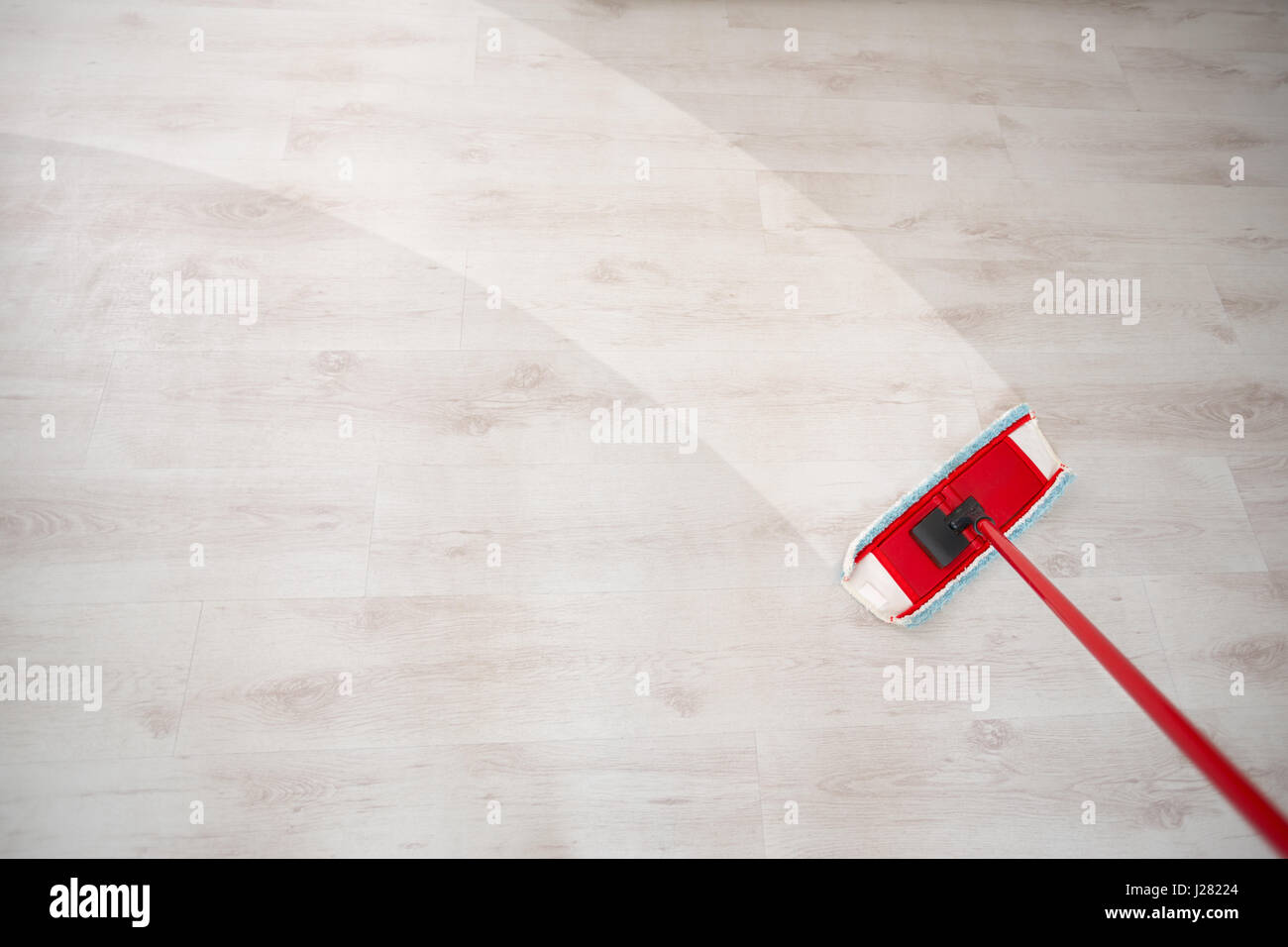 Wiping floor during spring cleaning Stock Photo Alamy