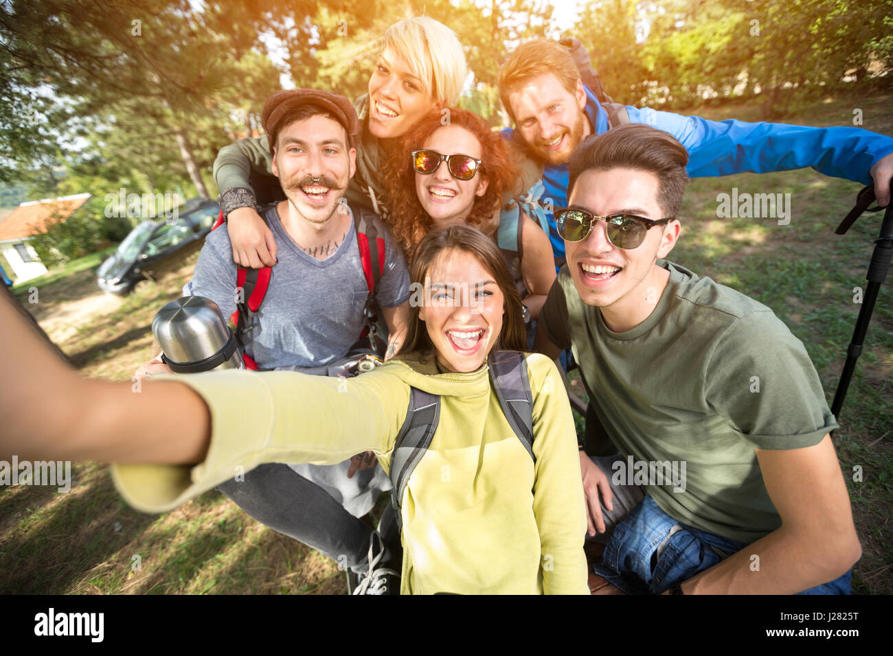 Young equip of hikers makes selfie in sunny nature Stock Photo - Alamy