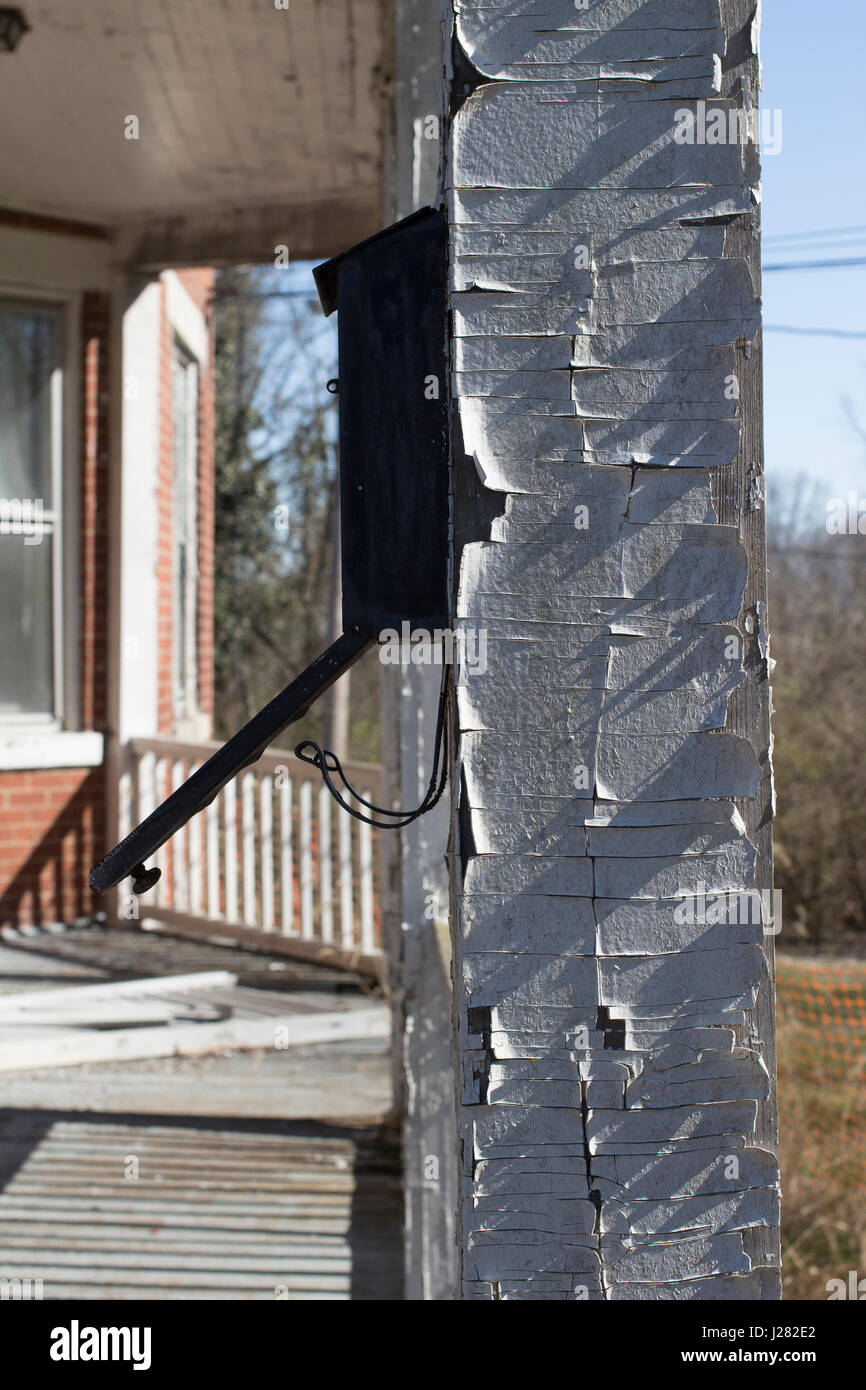 White paint chipping from an old style house Stock Photo Alamy