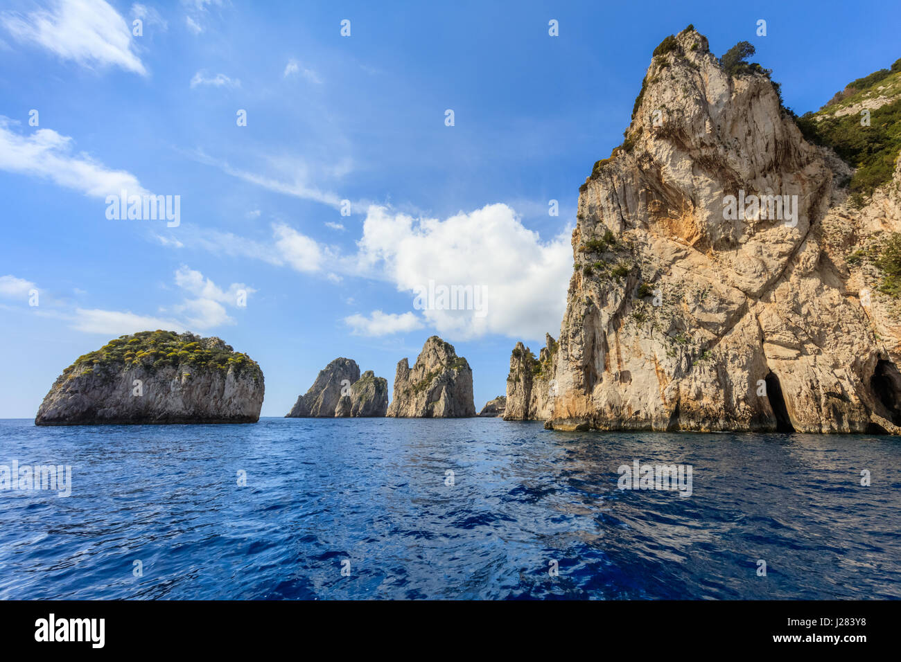 View on Faraglioni rocks from Capri island, Italy Stock Photo - Alamy