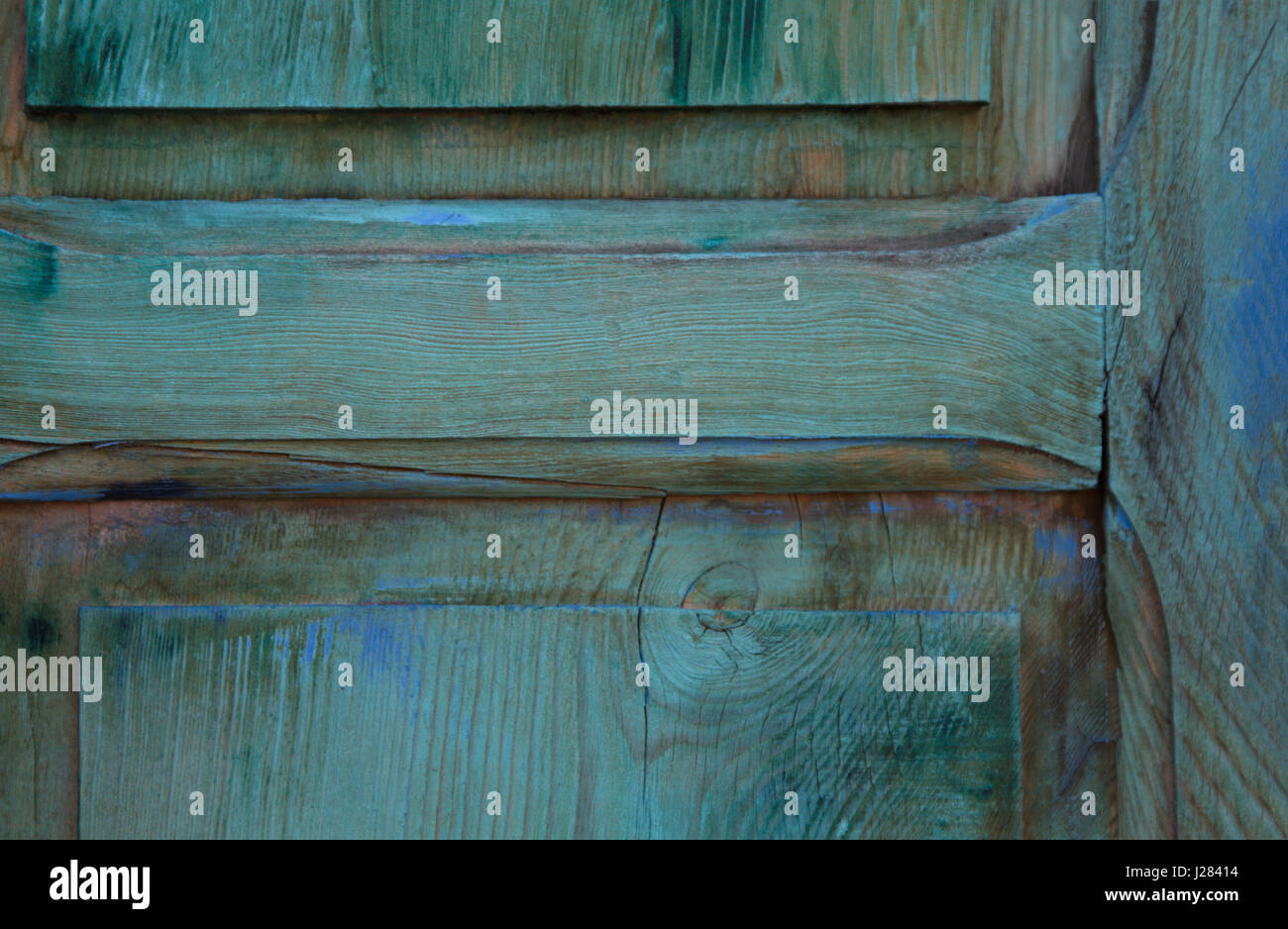 Attractive background of blue hues of wood grain on weathered door.  Location is along Canyon Road in Santa Fe, New Mexico, in America's Southwest. Stock Photo