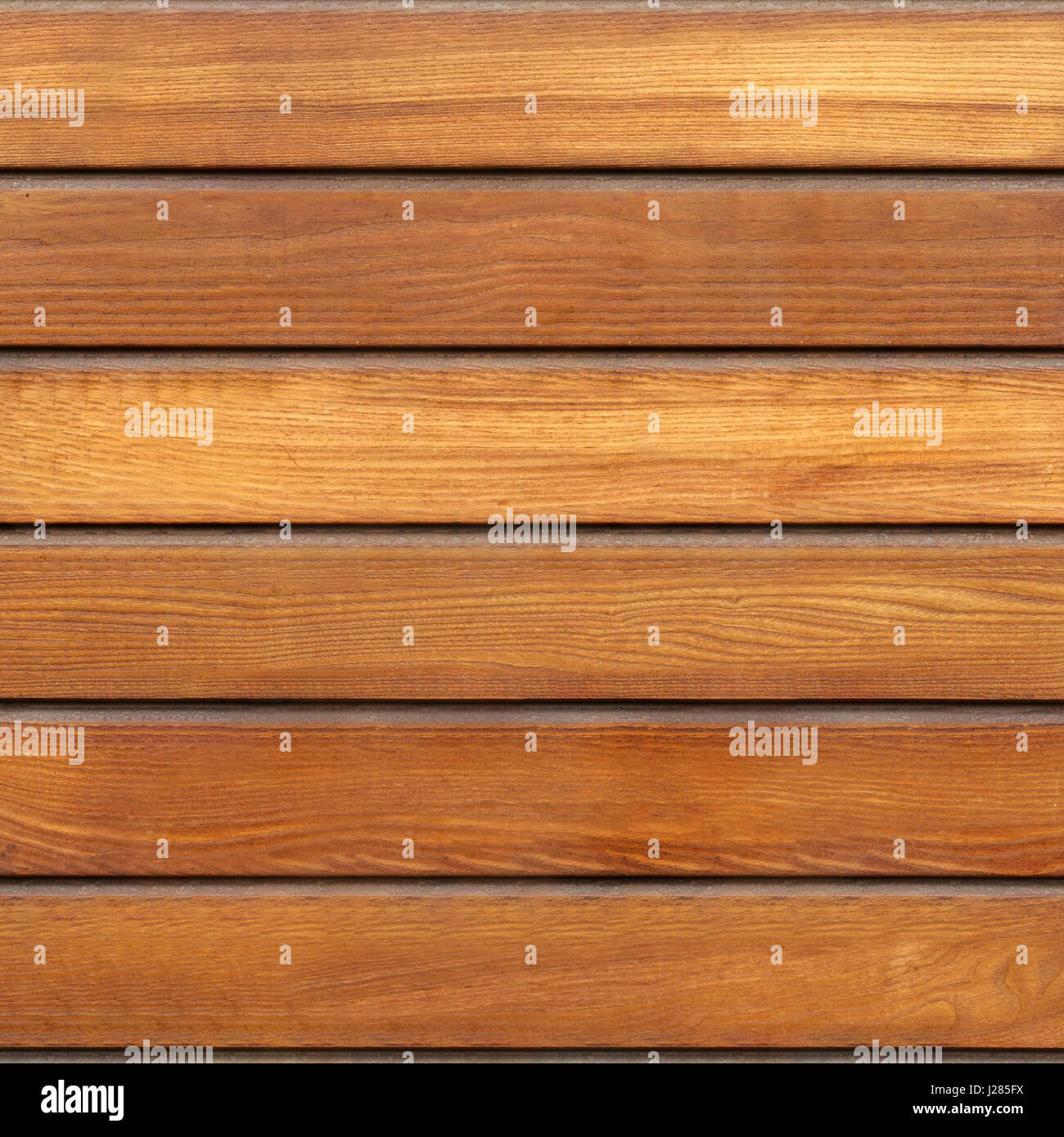 Wooden surface is brown color. Smooth texture. Stock Photo