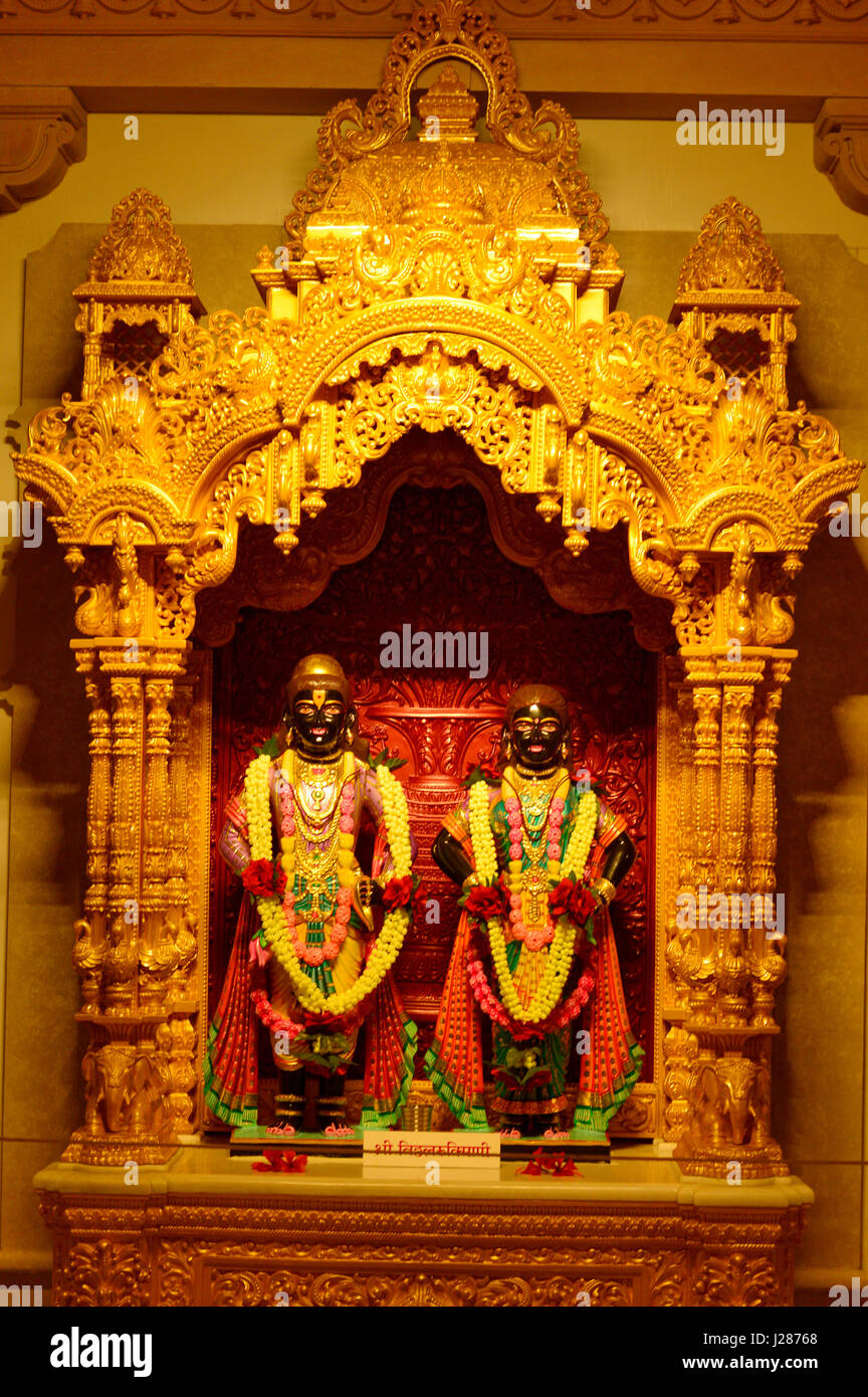 Shree Vitthal Rukmini deities in BAPS Shri Swaminarayan Mandir Pune Maharashtra Stock Photo