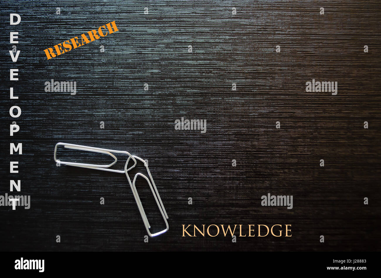 Two Connected Paper Clips On Dark Background Stock Photo Alamy Two connected paper clips on dark background stock photo alamy