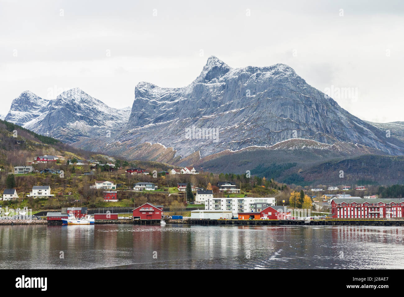 The village of Ørnes, in Nordland County, northern Norway, seen from a Hurtigruten Coastal Express cruise ship. Stock Photo
