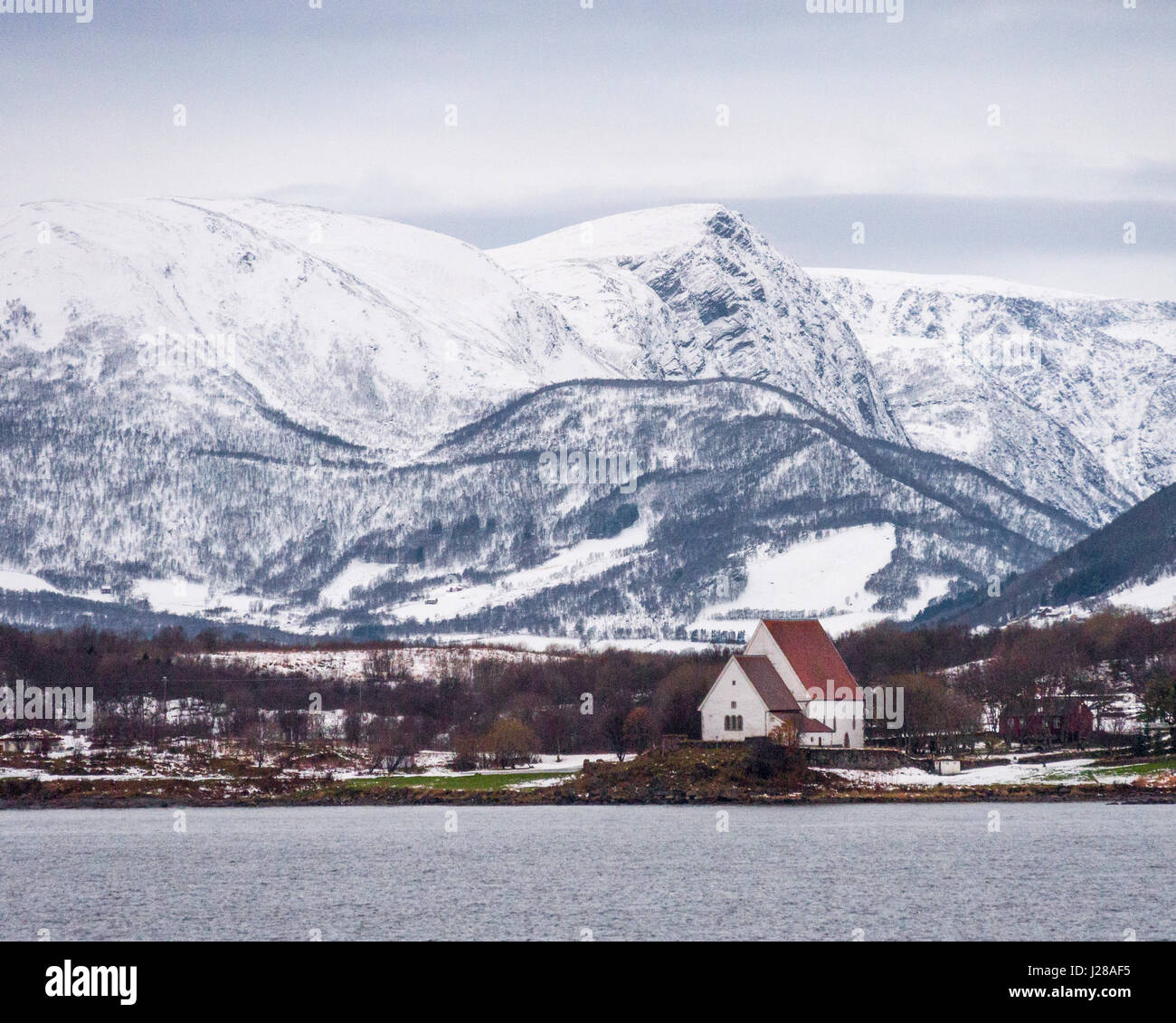 Trondenes Kirke is the northernmost medieval stone church in Norway, located near Harstad in Troms county. Stock Photo