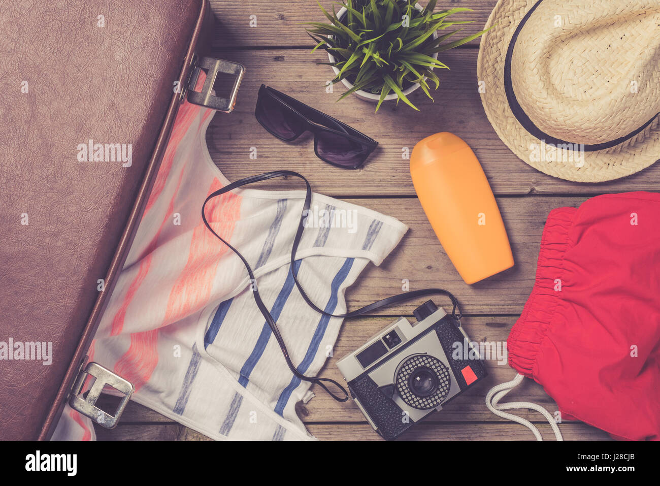 Men's beach clothes and accessories on wooden table Stock Photo Alamy