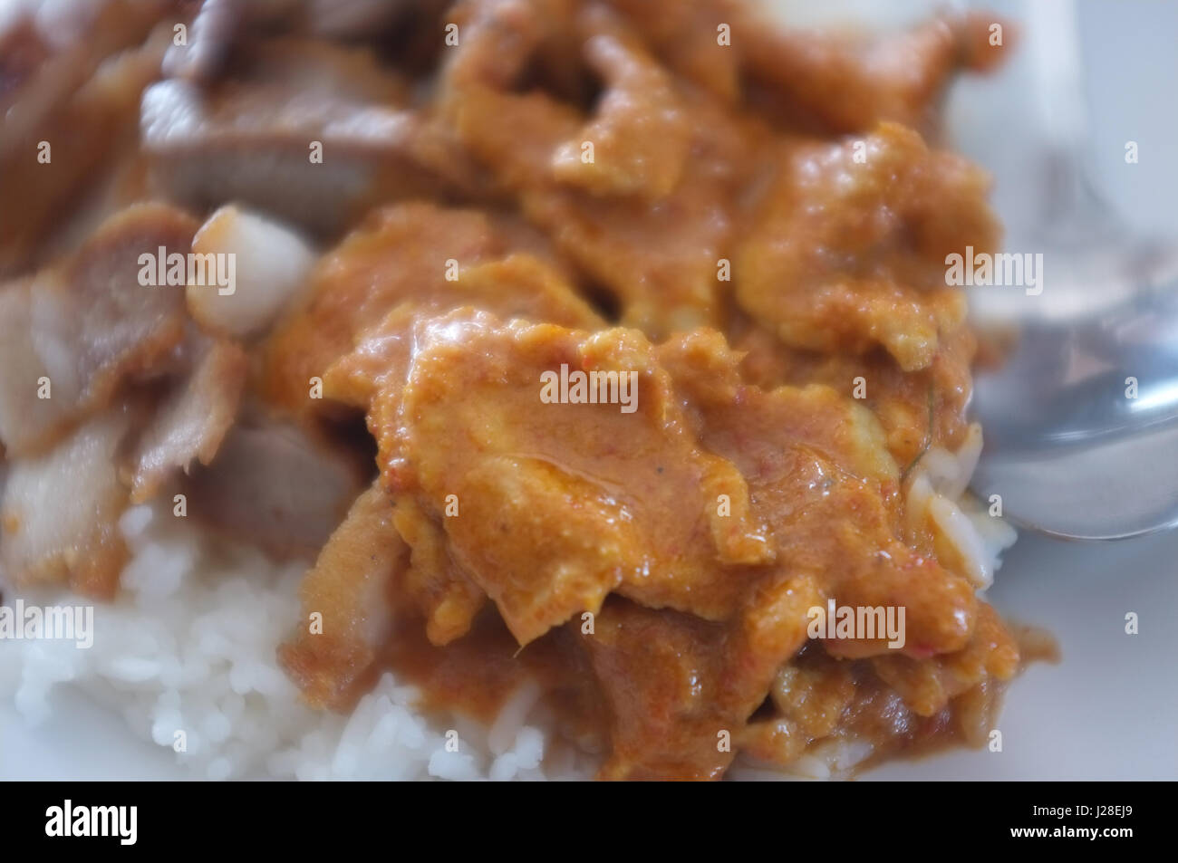 Thai cuisine , Panaeng Curry with Pork and fried pork belly with garlic , Concept street food Thailand Stock Photo