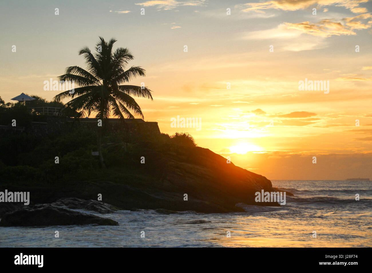 Sri Lanka, Southern Province, Bentota, sunset at Rockside Beach Resort ...