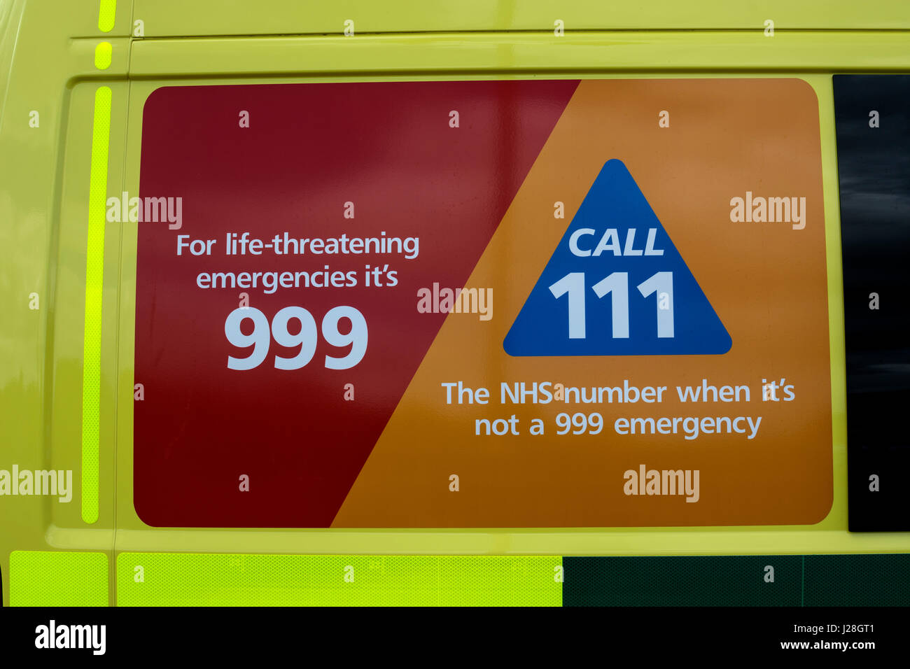 Emergency telephone numbers on an ambulance, UK Stock Photo
