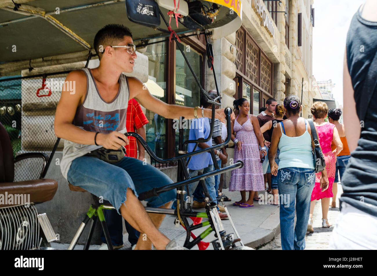 Cuba, Havana, Bicitaxi on the roadside Stock Photo - Alamy