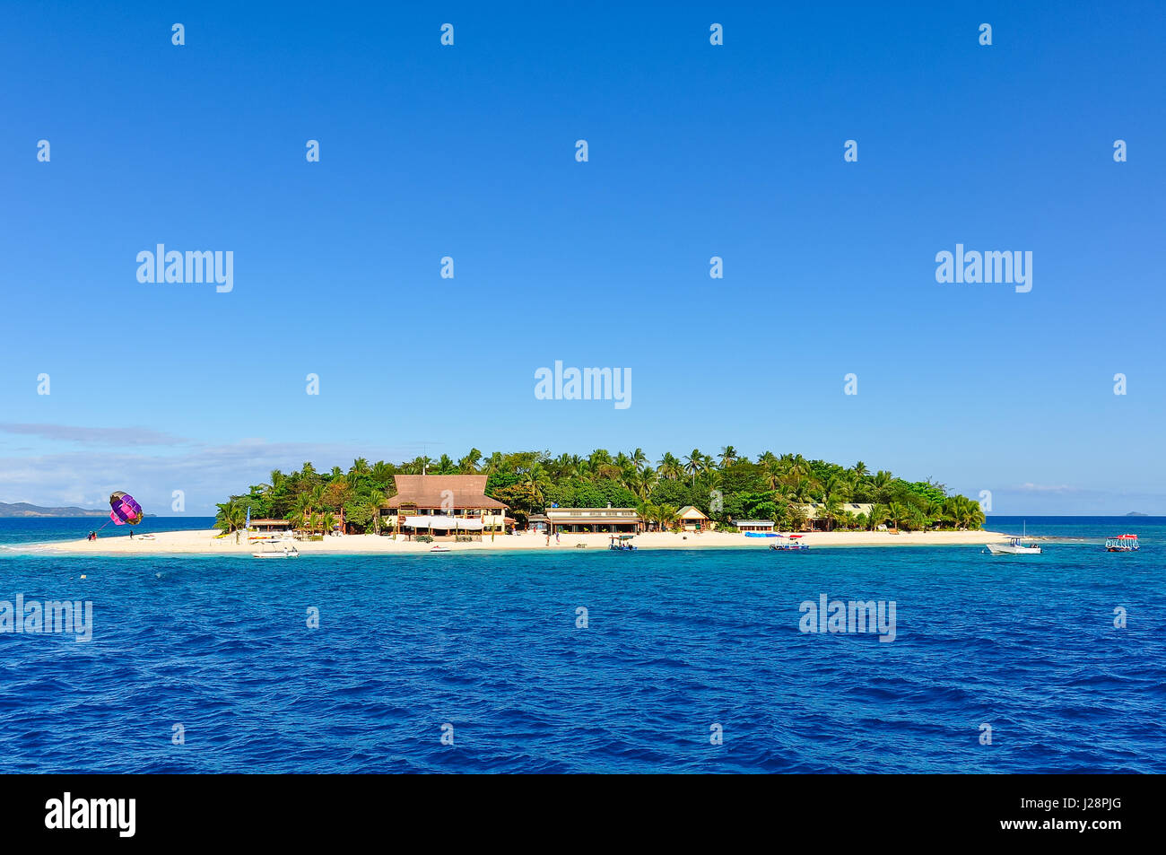 Close view of the tiny Beachcomber Island in Fiji Stock Photo