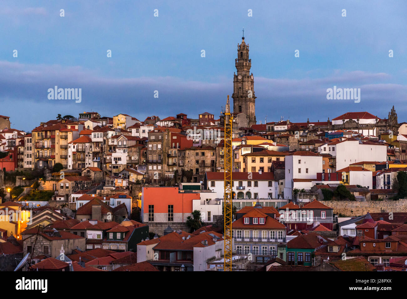 Sunrise over in Porto city on Iberian Peninsula, Portugal. View with bell tower of Clerigos Church Stock Photo
