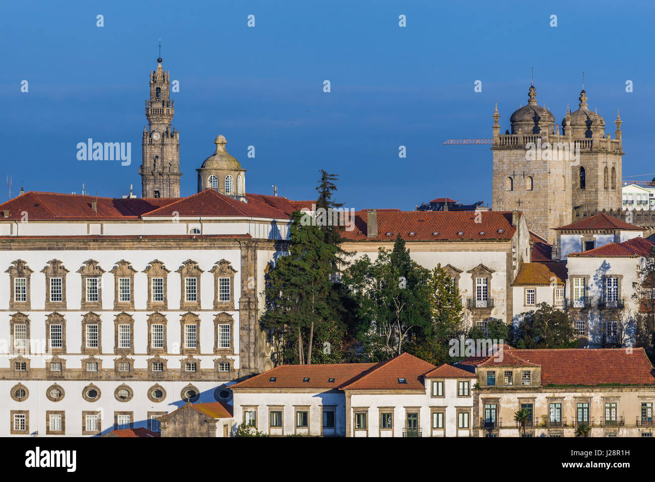 Bishop's Palace, Clerigos church tower and Se Cathedral in Porto city, second largest city in Portugal. View from Vila Nova de Gaia city Stock Photo