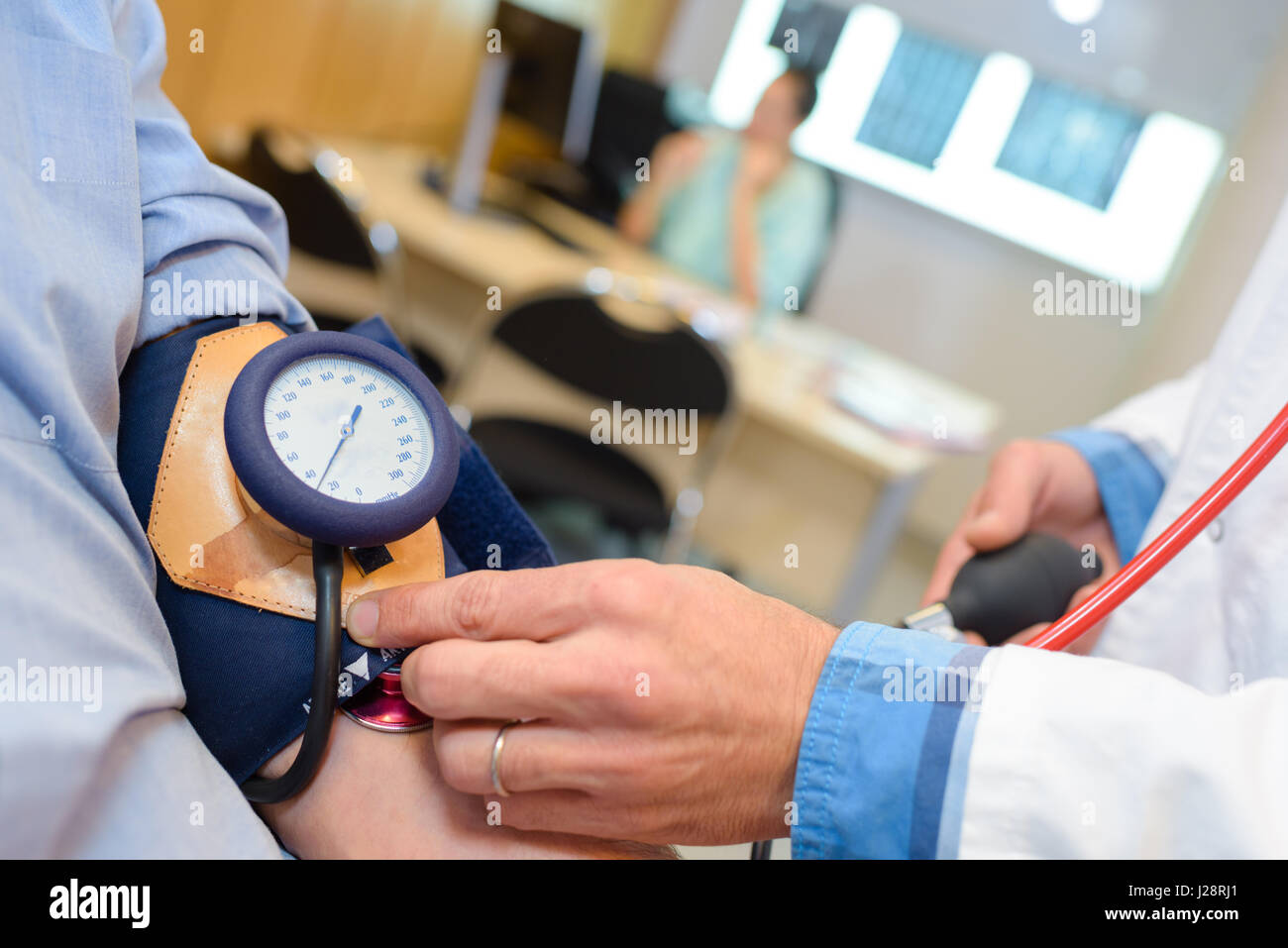 Blood pressure being taken hi-res stock photography and images - Alamy