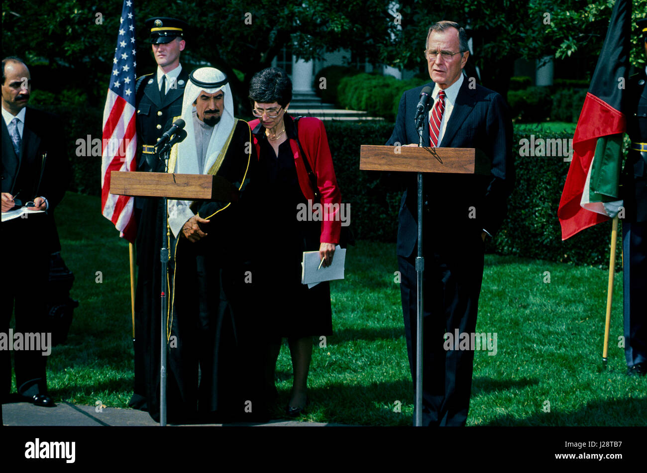 The Amir of Kuwait Sheik Jabir Al-Sabah stands next to President George H.W. Bush as they take questions from reporters on the South Lawn driveway after their meeting earlier in the Oval Office of the White House Washington DC. September 28, 1990.  Photo by Mark Reinstein Stock Photo