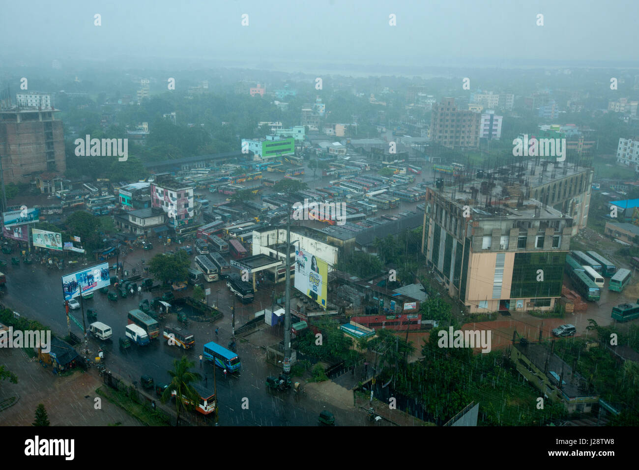 Rain over the Bahadderhat Bus Station in Chittagong, Bangladesh. Stock Photo