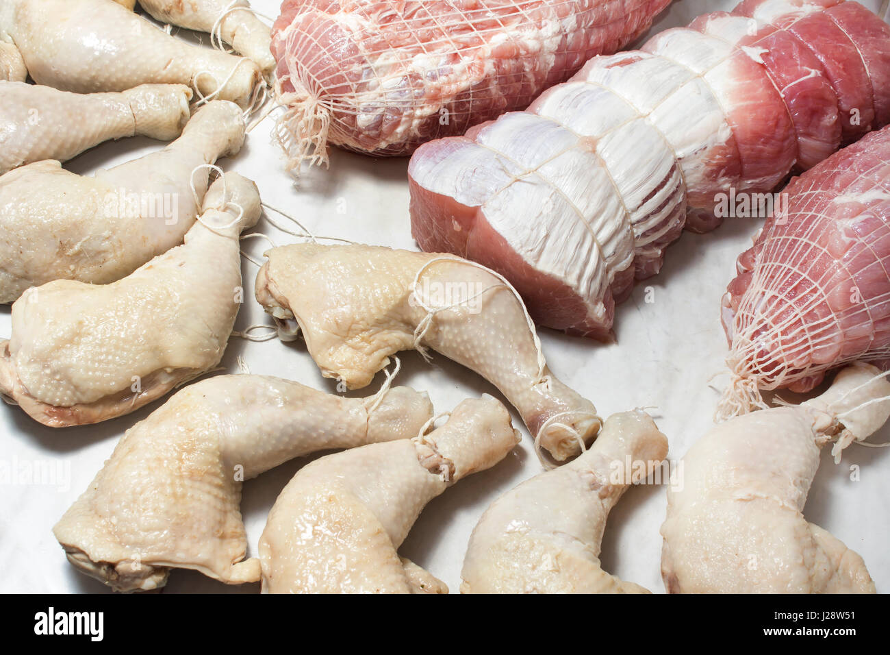 Preparation raw meat for smoking. Pork neck meat and bacon. Preparation of  meat for smoking chicken. Meat prepared for smoking Stock Photo - Alamy