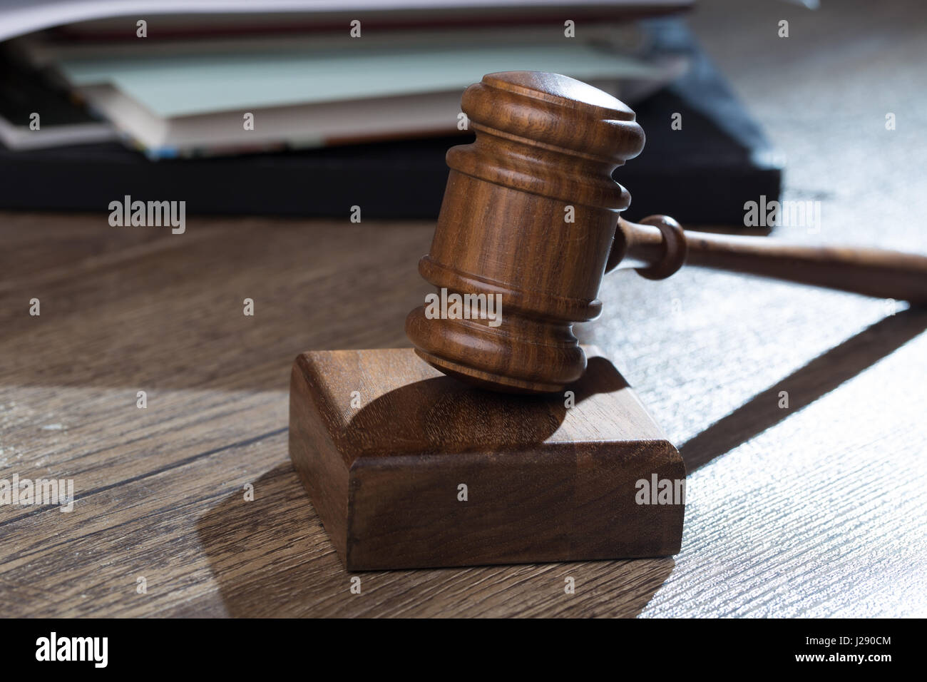 Judge hammer against of folder Stock Photo