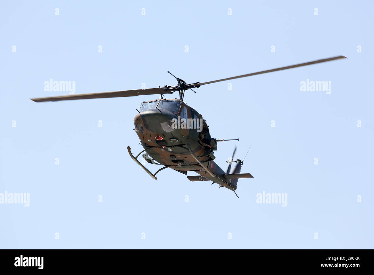 Japanese military helicopter in flight , Military helicopter flying Stock Photo