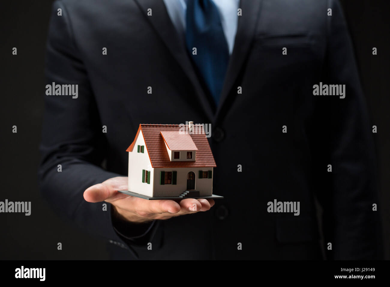 Holding architectural model of house hi-res stock photography and ...