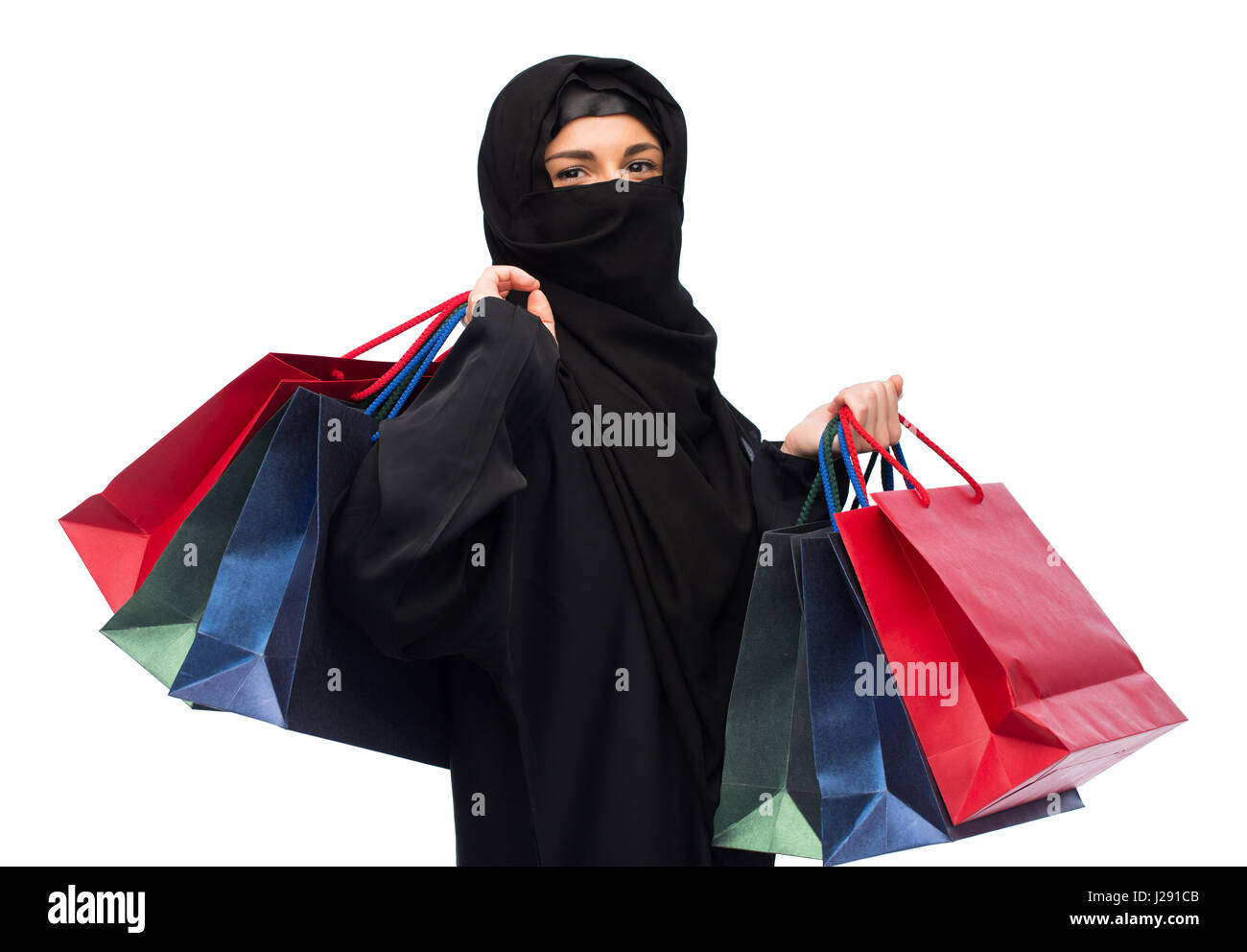 muslim woman in hijab with shopping bags Stock Photo - Alamy