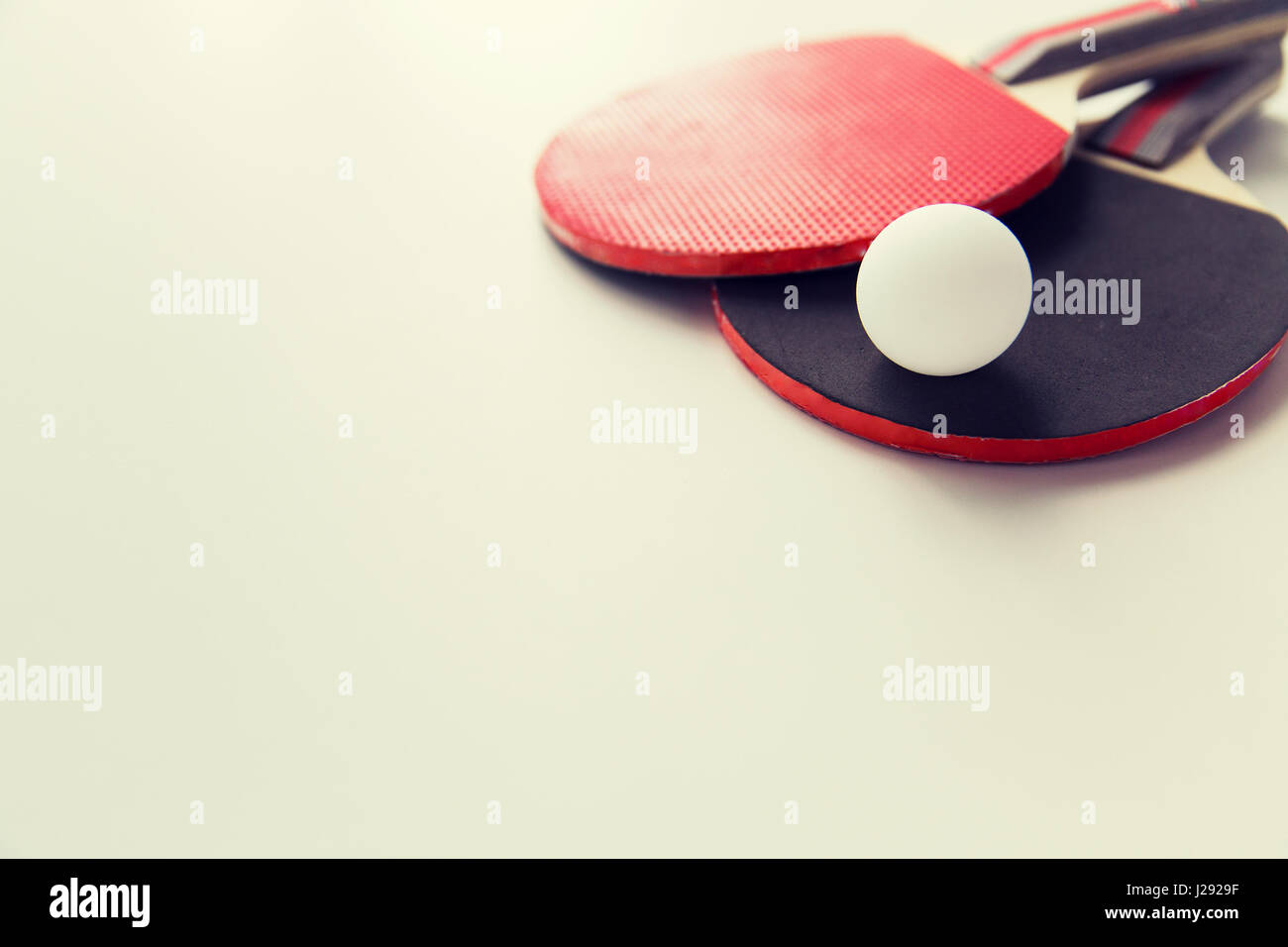 close up of table tennis rackets with ball Stock Photo - Alamy