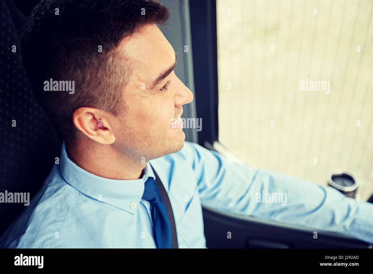 close up of happy bus driver or businessman Stock Photo