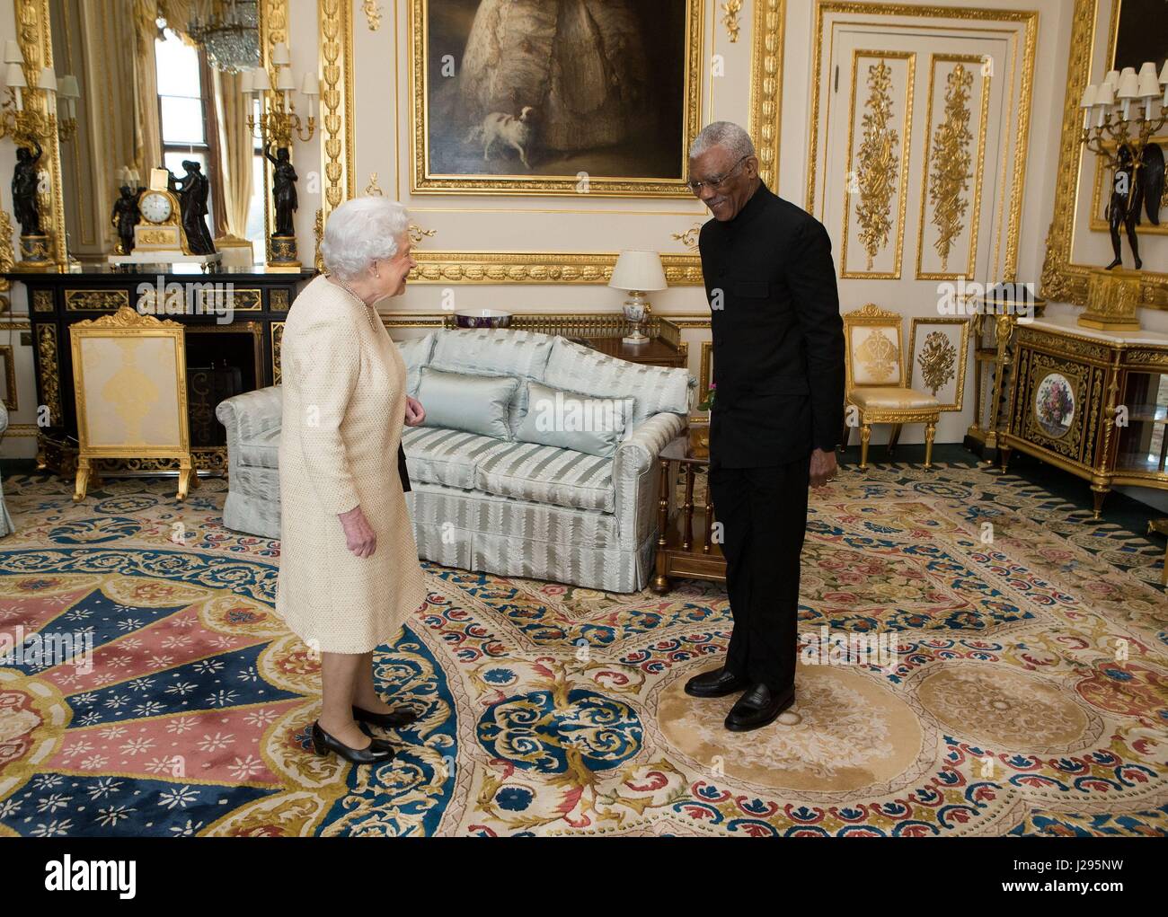 Queen Elizabeth II meets His Excellency David Granger, President of the Co-operative Republic of Guyana, during a a private audience with Her Majesty at Windsor Castle, Berkshire. Stock Photo