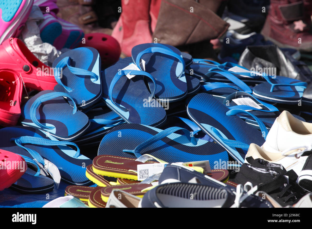 Blue Summer Shoes  on a  flea market stall Stock Photo
