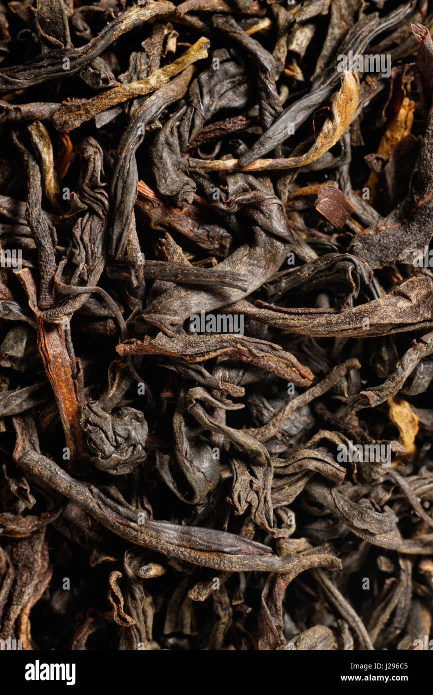 Close-up photograph of leaves of Black Tea. The image covers an area of 30mm x 20mm Stock Photo