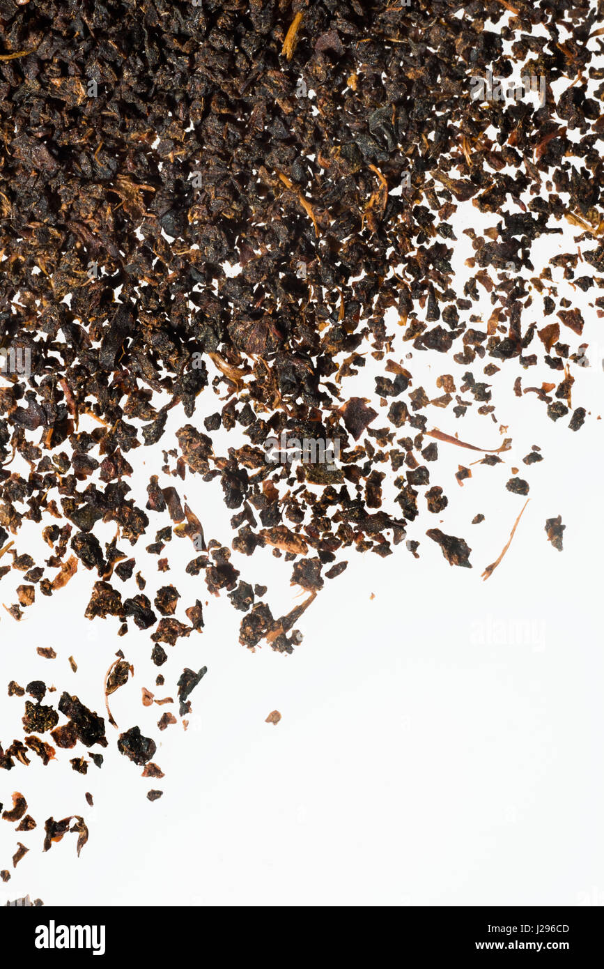 Close-up of the contents of a typical British tea-bag of ordinary quality. The image covers an area of 30mm x20mm. Stock Photo