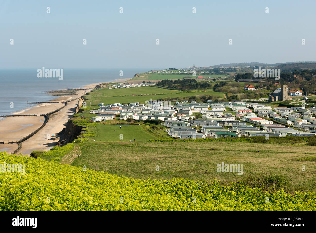 A landscape view of the Norfolk Coast UK at Beeston Regis showing a large static caravan or mobile home site Stock Photo