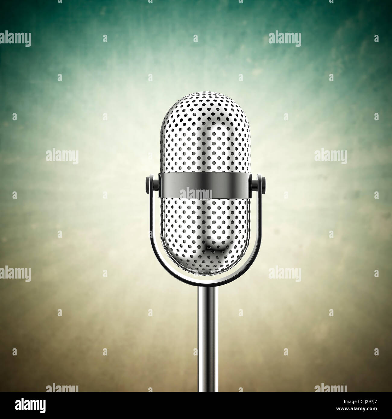 Vintage microphone isolated on a green background Stock Photo