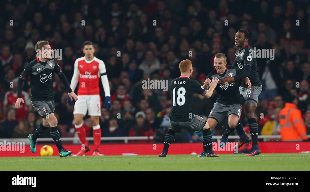Jordy Clasie of Southampton (2nd R)  celebrates after scoring  during the EFL Cup Quater-final match between Arsenal and Southampton at the Emirates Stadium in London. November 30, 2016. EDITORIAL USE ONLY - FA Premier League and Football League images are subject to DataCo Licence see www.football-dataco.com Stock Photo