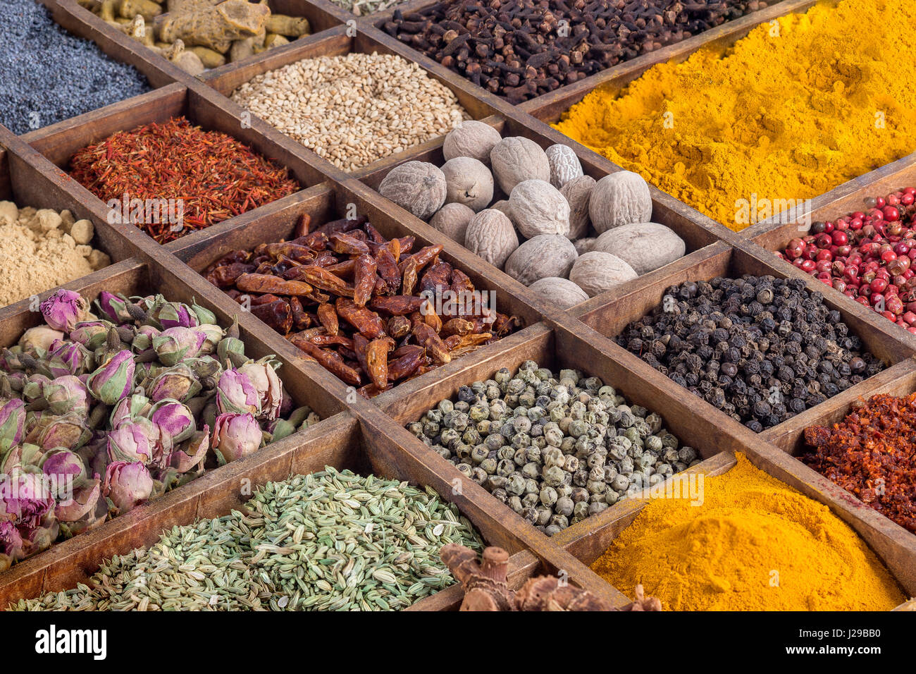 wooden box with spices and herbs Stock Photo