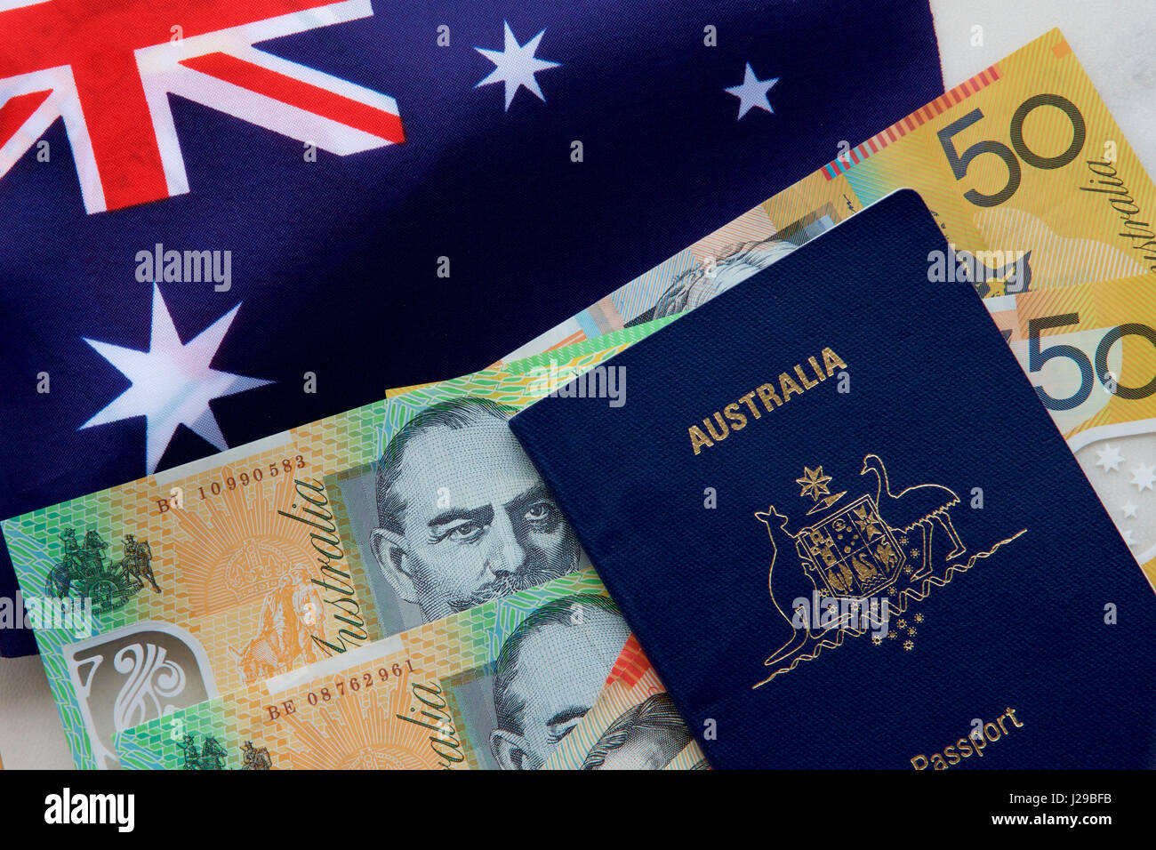 Australian passport, cash and flag Stock Photo Alamy
