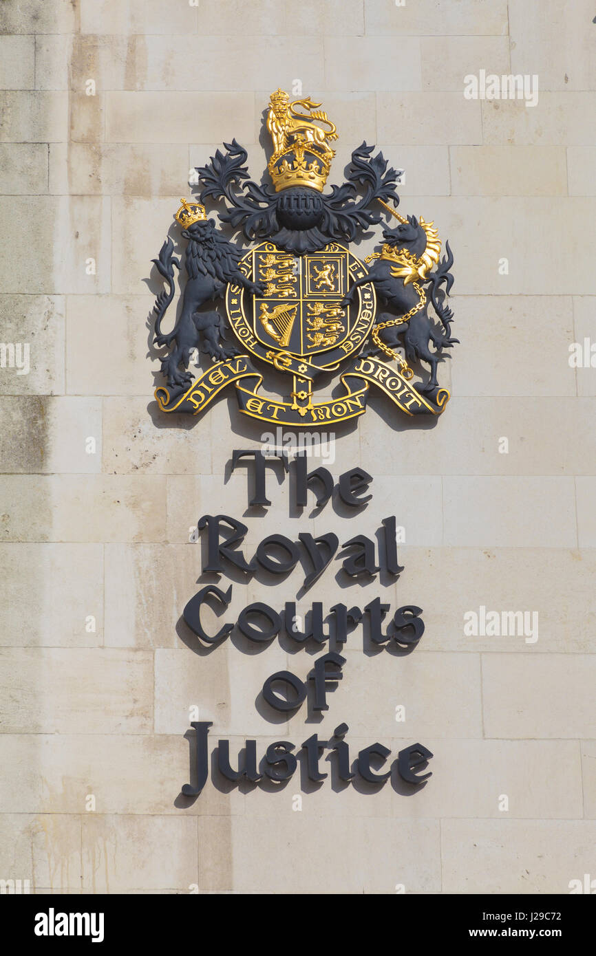 London, Westminster The wall-mounted emblem of The Royal Courts of ...