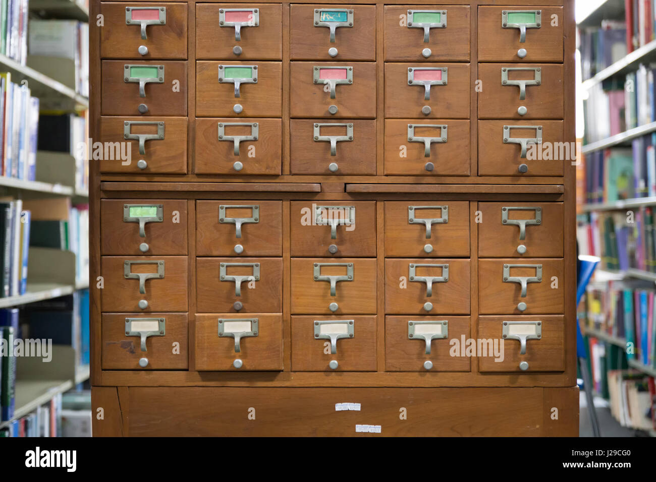An Old Style Wooden Cabinet Of Library Card Or File Catalog Index