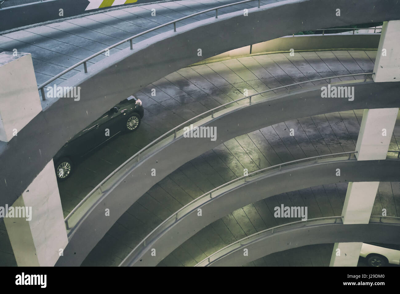 Circular ramp in the multi Level parking garage Stock Photo