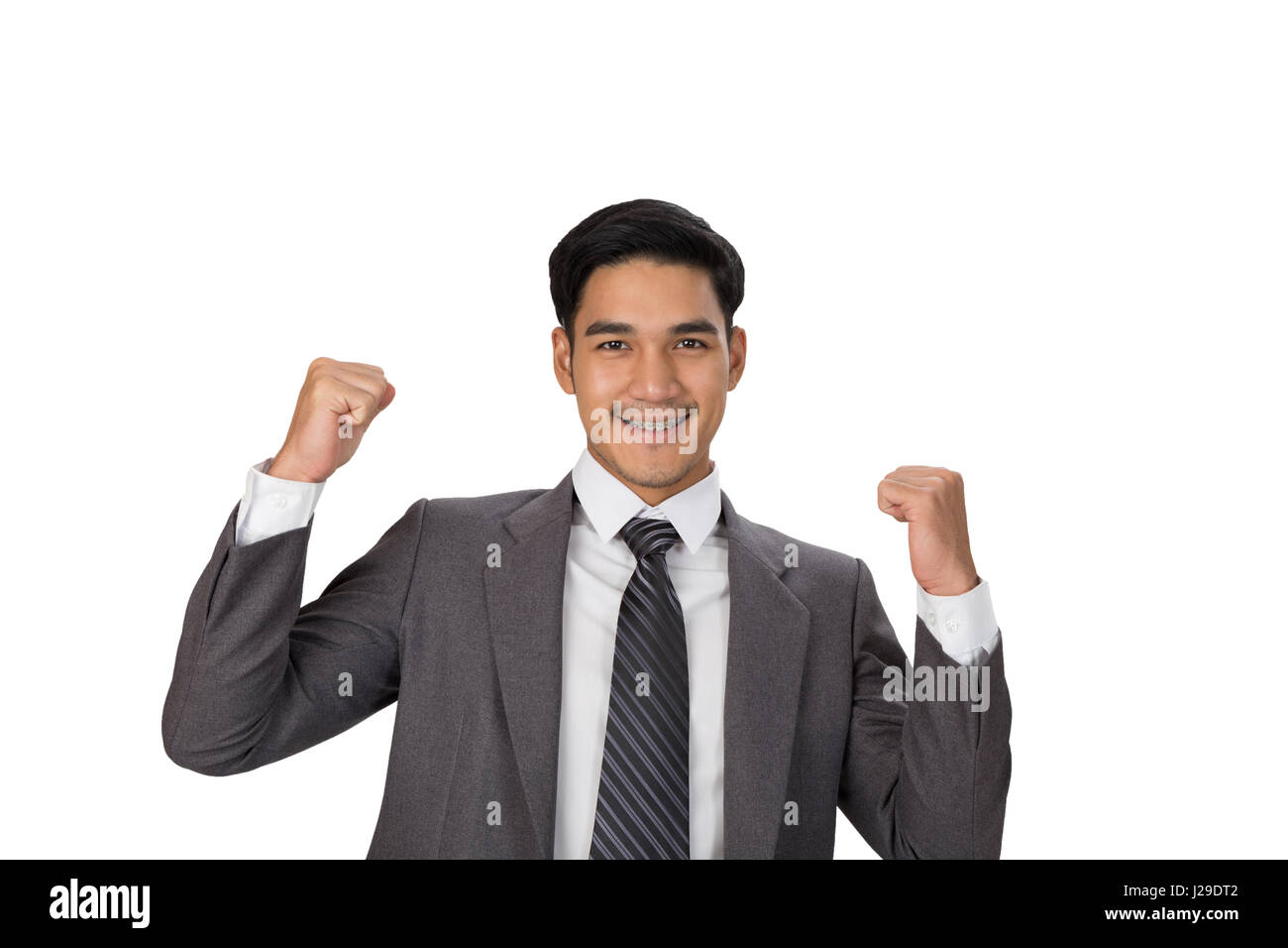 business, people, success, gladness and cheerful concept - young asian man startup entrepreneur businessman raise his hands with happiness on white ba Stock Photo