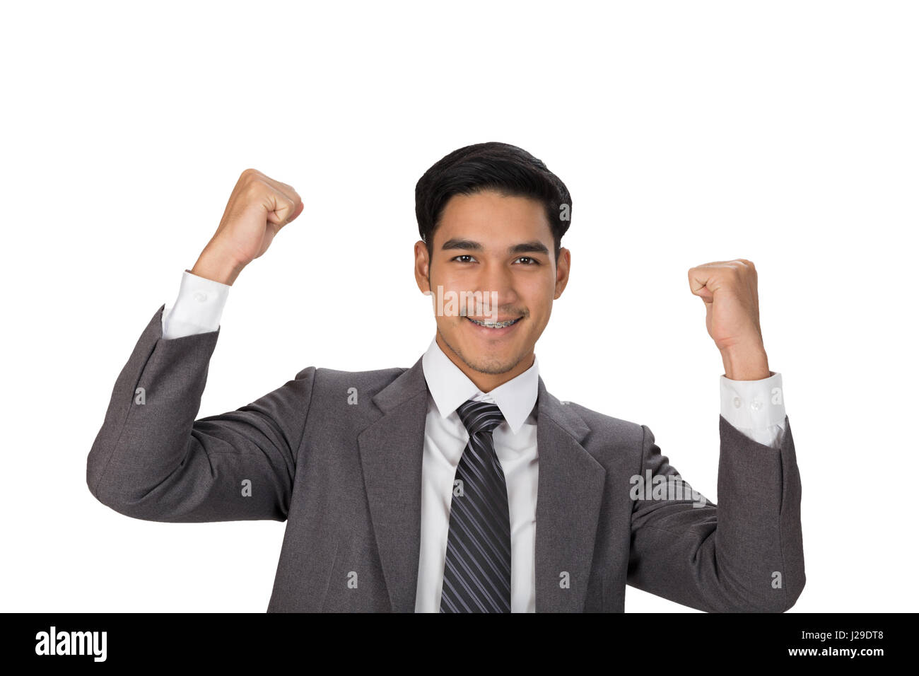 business, people, success, gladness and cheerful concept - young asian man startup entrepreneur businessman raise his hands with happiness on white ba Stock Photo